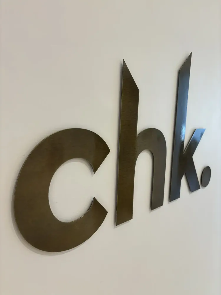 Chk Brushed Brass Sign01 – Graphics & Signage project by Design Tints, Auckland